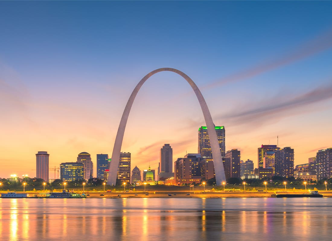 St. Louis, MO - View of Downtown Cityscape on the River During Twilight